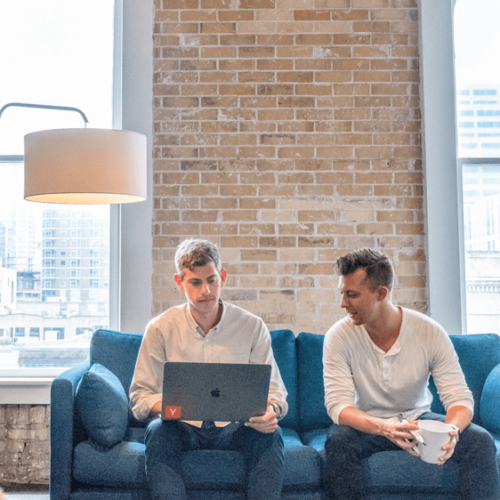 Marketing team collaborating on a client project